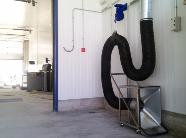 Tubo de aspiración móvil por carril