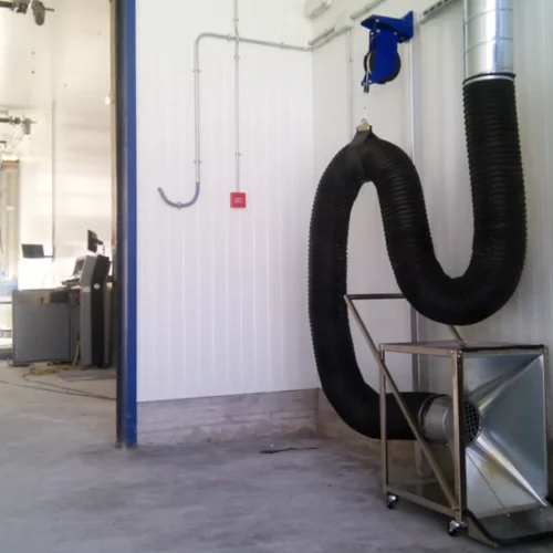 Tubo de aspiración móvil por carril